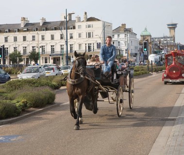Horse and carriage ride along the seafront, Great Yarmouth, Norfolk, England, United Kingdom,