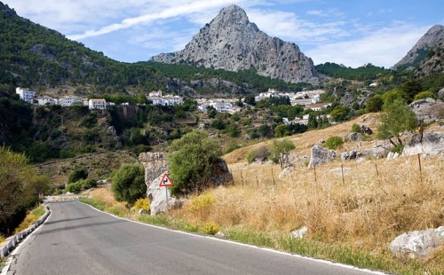 Limestone mountain peaks tower over the Village of Grazalema, Cadiz province, Spain, Europe