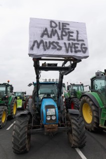 Tractor with sign, The traffic lights must go, Farmer protests, Demonstration against policies of
