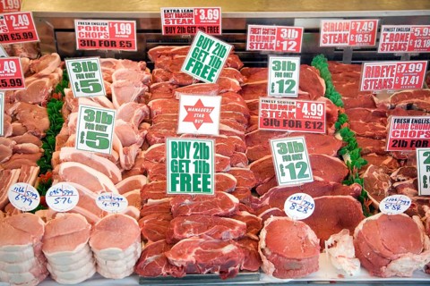 Meat display in butcher's shop window