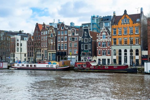 Typical row of houses with canal houses on the Amstel canal, centre, urban, facade, history, city