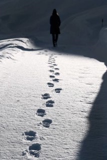 Hiking in a winter landscape in the Beverin nature park Park, Graubuenden, Switzerland, Europe