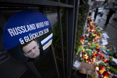 Photos, candles, grave lights and flowers for the Russian opposition leader Alexei Navalny, who