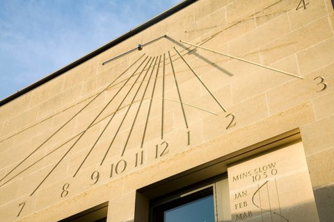 Modern sun dial clock Foundress Court sundial in Pembroke College, University of Cambridge,
