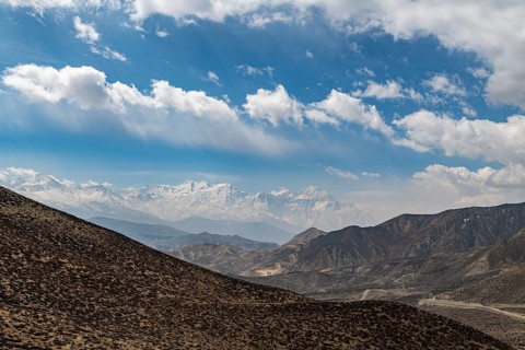 Desert landscape before the Annapurna mountain range, Kingdom of Mustang, Nepal, Asia