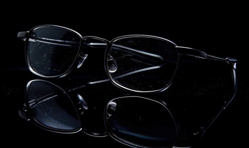 Modern sunglasses reflecting on a dark surface creating a sleek look AI generated