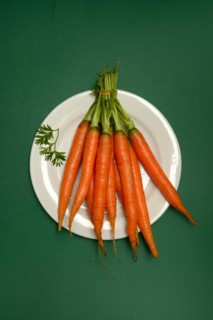 A bunch of carrots on a plate, Daucus carota, carrots