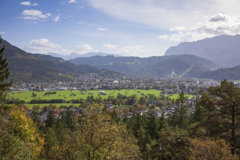 Wetterstein mountains with forest in autumn, hiking trail Kramerplateauweg, Garmisch-Partenkirchen,