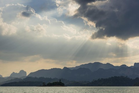 Limestone rocks in the evening light in Cheow Lan Lake in Khao Sok National Park, evening, sunset,