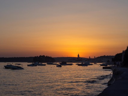 Sunset over a bay near the town of Rab, island of Rab, Kvarner Gulf Bay, Croatia, Europe
