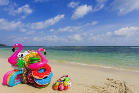 Sale of inflatable swimming aids, colourful, swimming, beach vendor, holiday, symbol, symbolic,