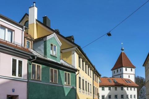 Facades, chimneys and dormers in Baeckerstrasse with Illertor, Kempten, Allgaeu, Bavaria, Germany,