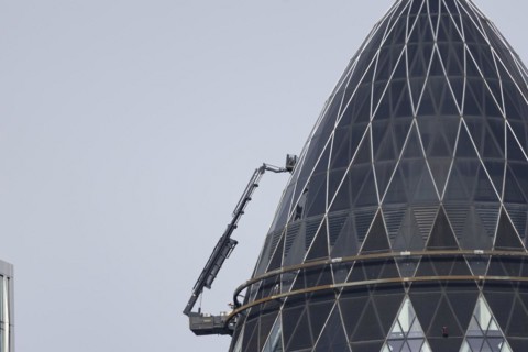 The Gherkin skyscraper building close up of window details, City of London, England, United