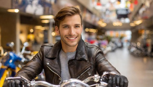 AI generated, A young man tries out a motorbike at the dealership