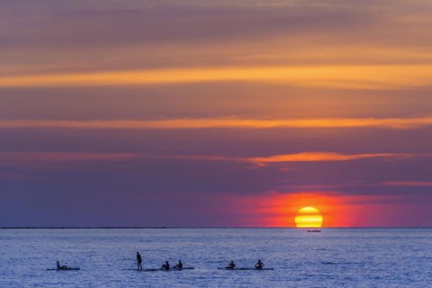 Sunset with course for stand-up-paddeleng, water sports, evening mood, sun, travel, holiday,