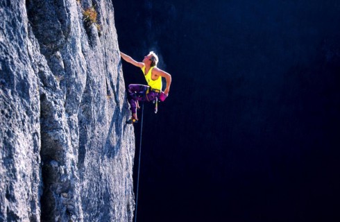 Climber on a route in the 7th degree of difficulty of the German scale, Wittlinger Felsen, Urach