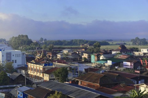 View of a town with traditional buildings at dawn, Pindaya, Inle Lake, Myanmar, Asia