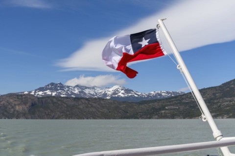 Boat trip, glacial lake, flag, Lago Grey, Torres del Paine National Park, Parque Nacional Torres