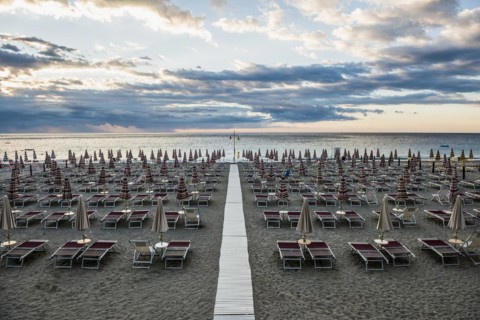 Empty beach and beach loungers, sunrise, Spotorno, Riviera di Ponente, Liguria, Italy, Europe