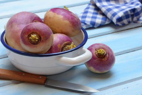 Purple beetroot in pot with knife, Brassica rapa