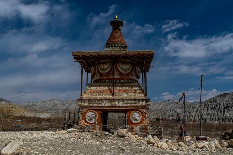 Colourfully painted Buddhist stupa, Tsarang, Kingdom of Mustang, Nepal, Asia