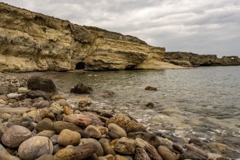 Beach with colourful stones near Malolo, Milos, Cyclades, Greece, Europe