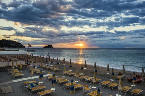 Empty beach and beach loungers, sunrise, Spotorno, Riviera di Ponente, Liguria, Italy, Europe