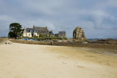 Houses and granite rocks on the beach, Plougrescant, Cote de Granit Rose, Cotes d'Armor, Brittany,