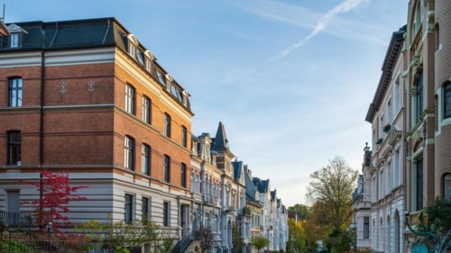Old flats in a quiet street with autumn trees, Wilhelminian style, Briller Viertel, Elberfeld,