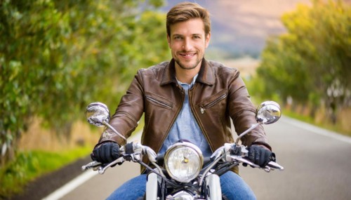 AI generated, EA young man rides his motorbike through an autumn landscape