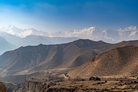 Desert mountain scenery with the Annapurna mountain range in the background, Kingdom of Mustang,