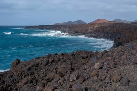 Lava rocks in the sea, surf, near Los Hervideros, Lanzarote, Canary Islands, Spain, Europe