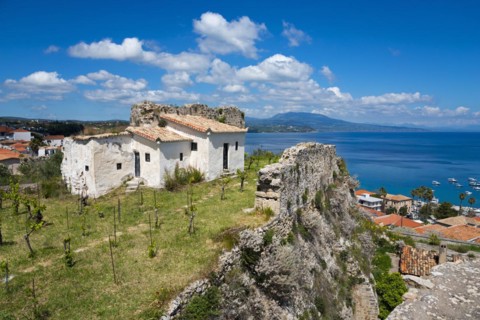 A ruin on a cliff overlooking the sea and surrounding vegetation, Byzantine fortress, old town and