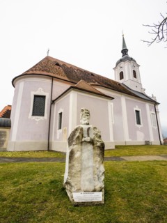 Stone sculpture, St Bartholomew, behind the Roman Catholic parish church of St Nicholas, Stubenberg