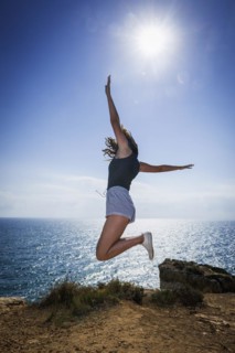 Happy young woman on summer holiday, jump, jumping, jumping, young, glad, happy, luck, joy,