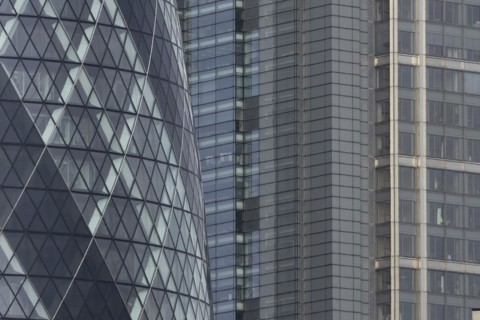 The Gherkin skyscraper building and nearby high rise office building, City of London, England,