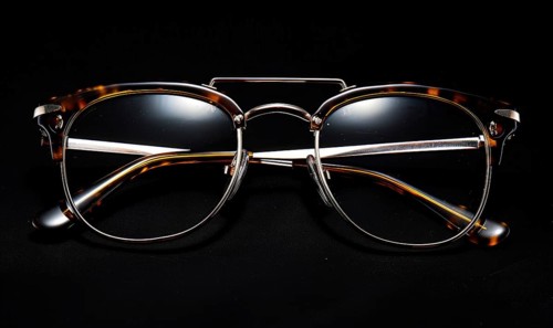 Classic tortoise shell sunglasses with thick frames on a reflective dark surface AI generated