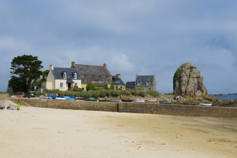 Houses and granite rocks on the beach, Plougrescant, Cote de Granit Rose, Cotes d'Armor, Brittany,