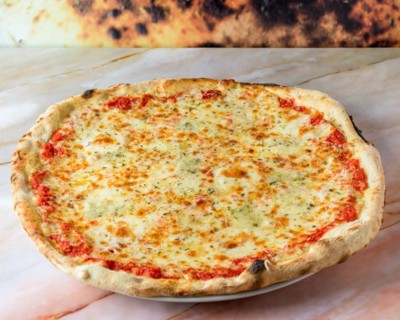 Family Pizza Cooked with Four Cheese Recipe, Oregano and Basile Baked and Ready to Eat, pizza