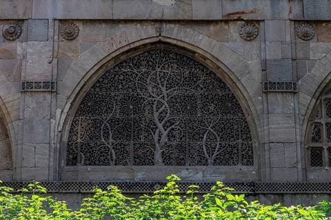Beautiful ornamented window in the Sidi Saiyyed Mosque, Unesco site, Ahmedabad, Gujarat, India,