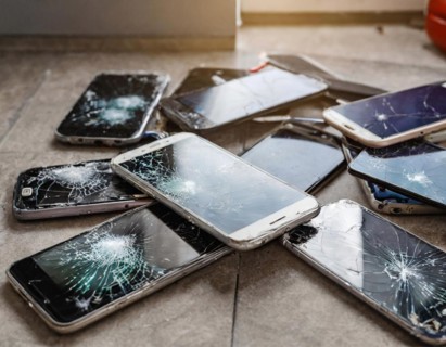 A collection of broken mobile phones with shattered screens on the floor, AI generated, AI