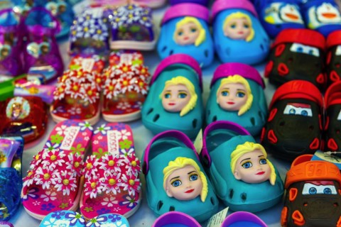 Colourful plastic children's shoes on the market, asian, colourful, funny, shoes, plastic,