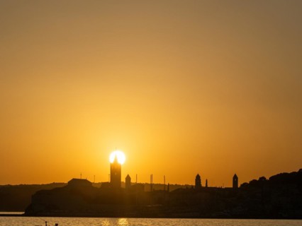 Sunset, silhouette of the church towers of Rab, town of Rab, island of Rab, Kvarner Gulf Bay,