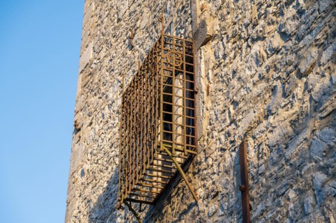 Detailed view of an old window with robust iron grille, manor house, Schoeller, Wuppertal,