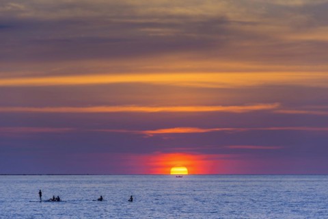 Sunset with course for stand-up-paddeleng, water sports, evening mood, sun, travel, holiday,