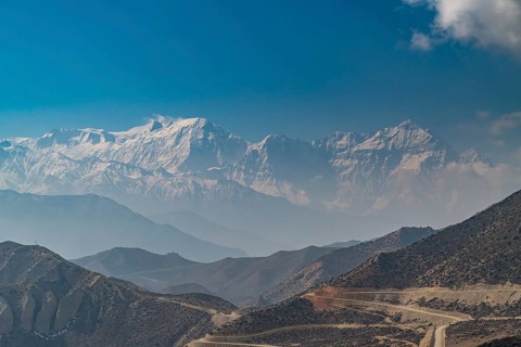 Desert mountain scenery with the Annapurna mountain range in the background, Kingdom of Mustang,