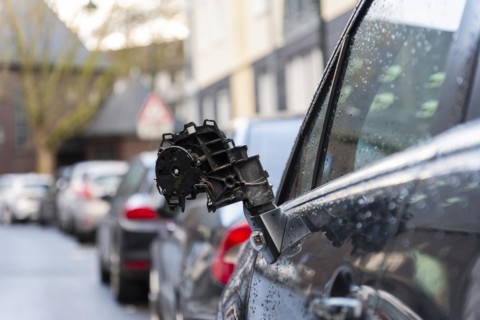 Torn off side mirror after an accident with a car that was parked on the side of the road,