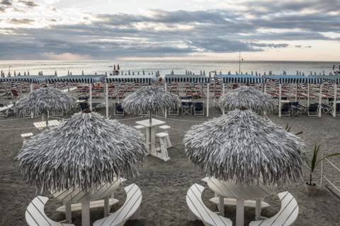 Empty beach and beach loungers, sunrise, Spotorno, Riviera di Ponente, Liguria, Italy, Europe