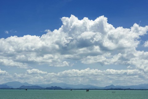 Island world near Surat Thani during ferry trip to Koh Samui, cloud, sky, blue sky, water, sea,