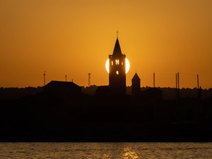 Golden evening light at sunset, silhouette of the church towers of Rab, town of Rab, island of Rab,